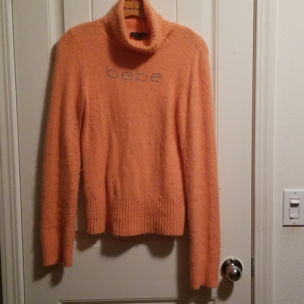 BEBE Rhinestone Orange soft sweater no damage